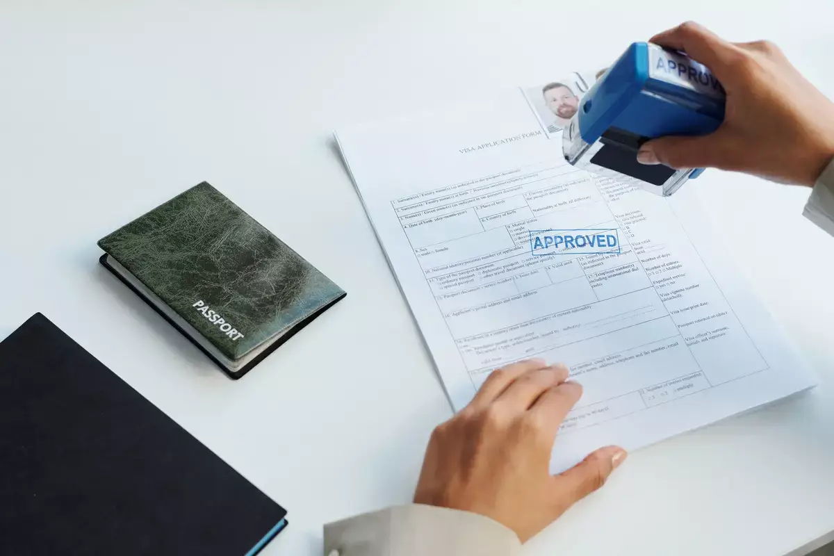 approving-travel-visa-for-man