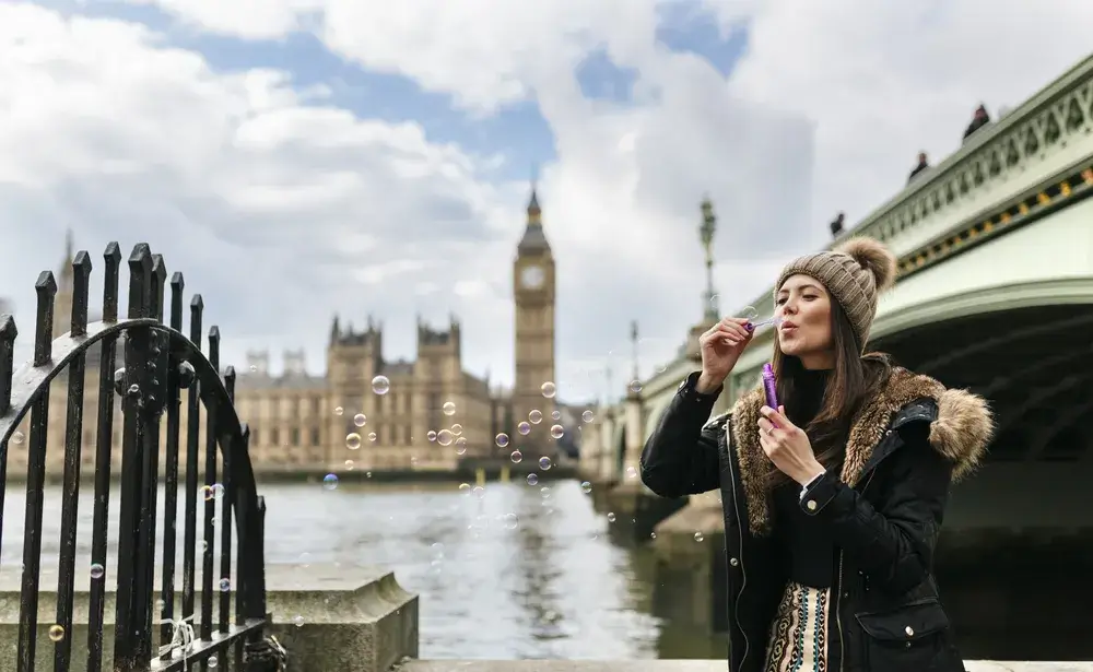 uk-london-young-woman-blowing