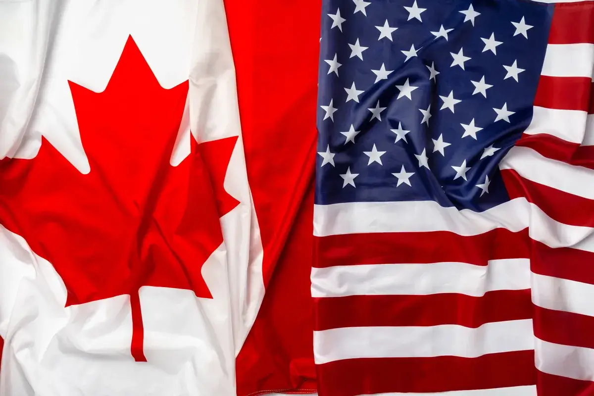 flags-of-canada-and-usa-folded