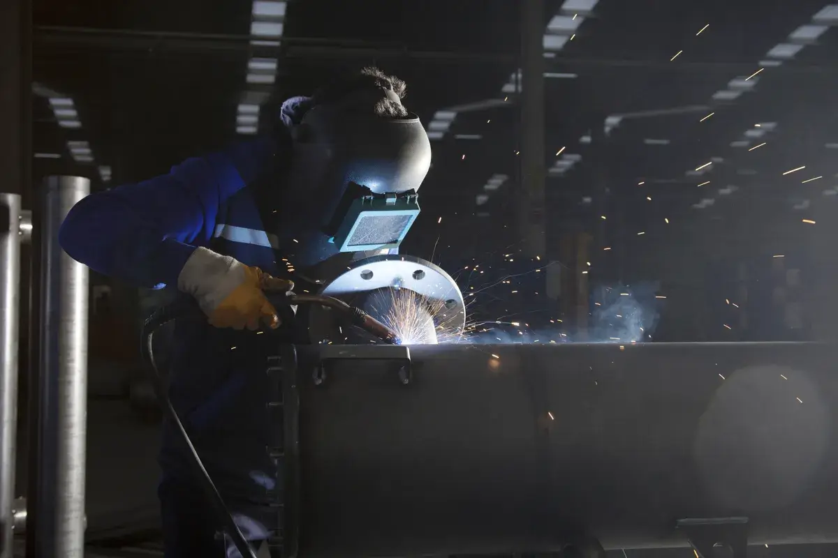 welding-workshop-and-welder.webp