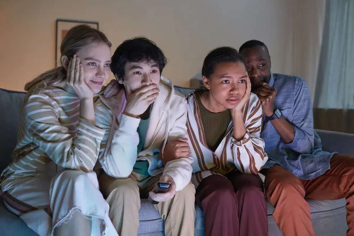 friends-watching-tv-at-night