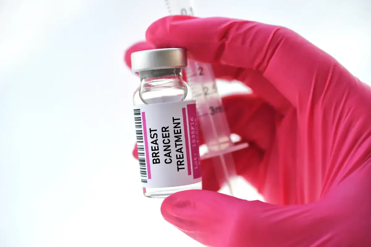 doctor-wearing-pink-medical-gloves