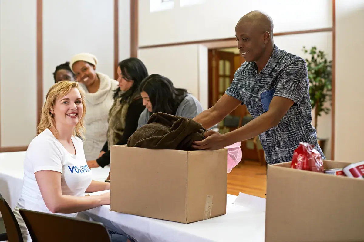 cropped-portrait-of-a-volunteer-collecting