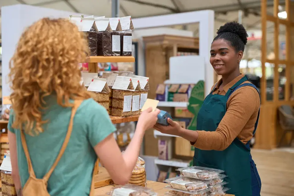 customer-paying-with-contactless-card-at-bakery