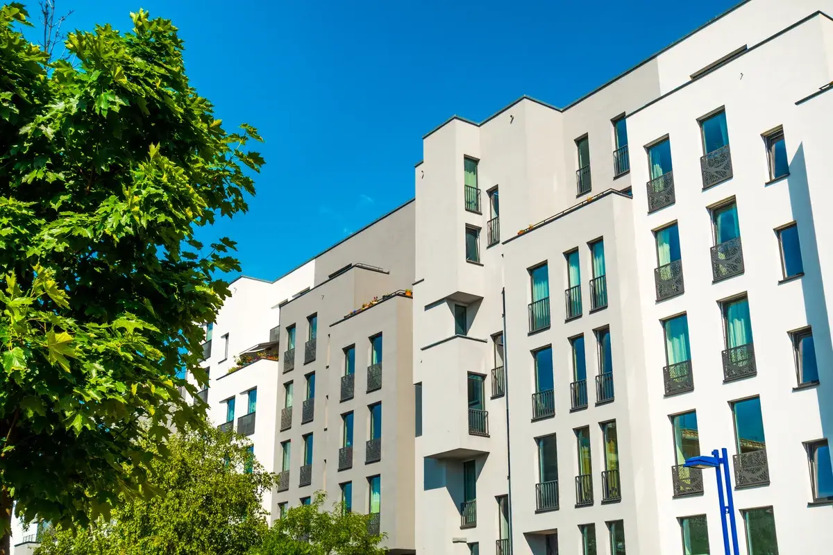 expensive-apartment-buildings-with-green-trees