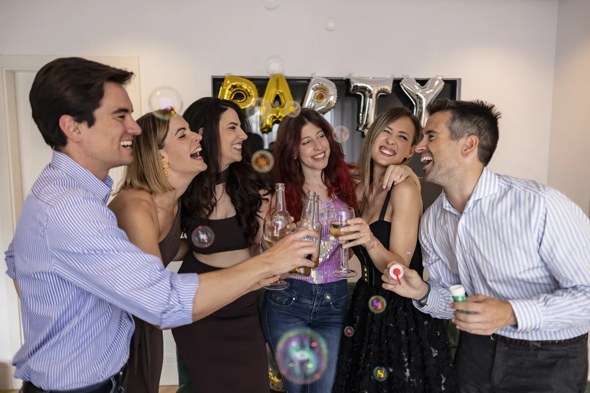 friends-toasting-at-a-party-playing