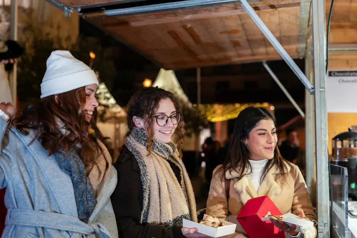 friends-enjoying-sweets-at-a-festive