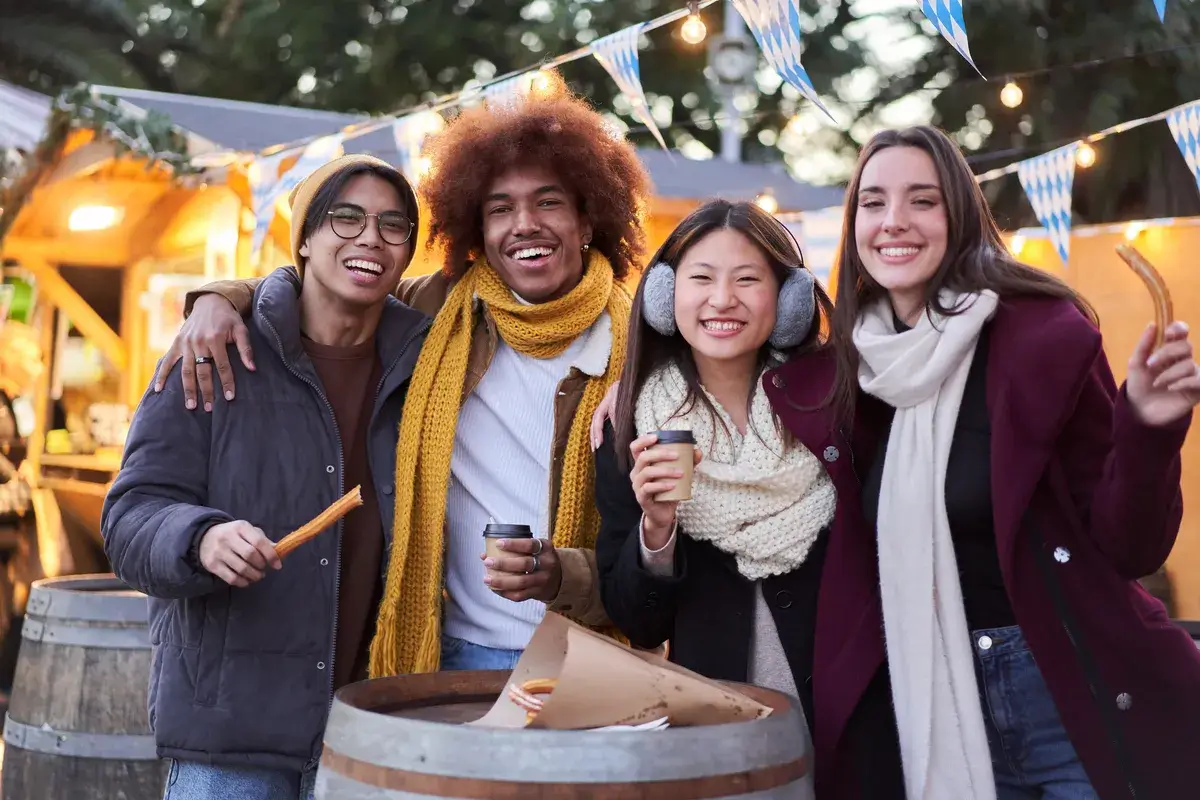 happy-friends-eating-chocolate-with-churros