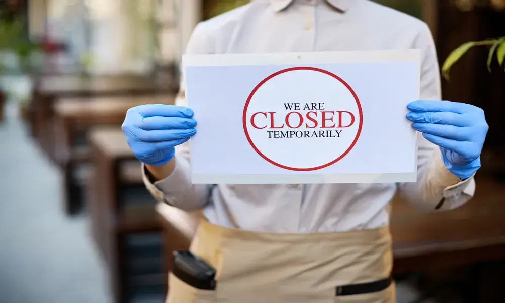 close-up-of-waitress-holding