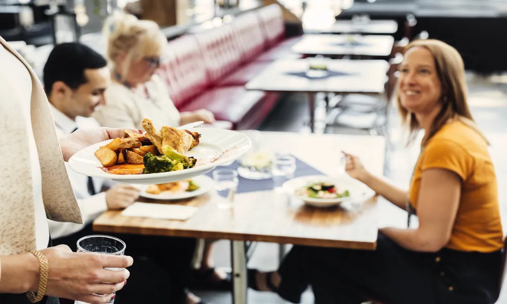 four-colleagues-meeting-over-lunch