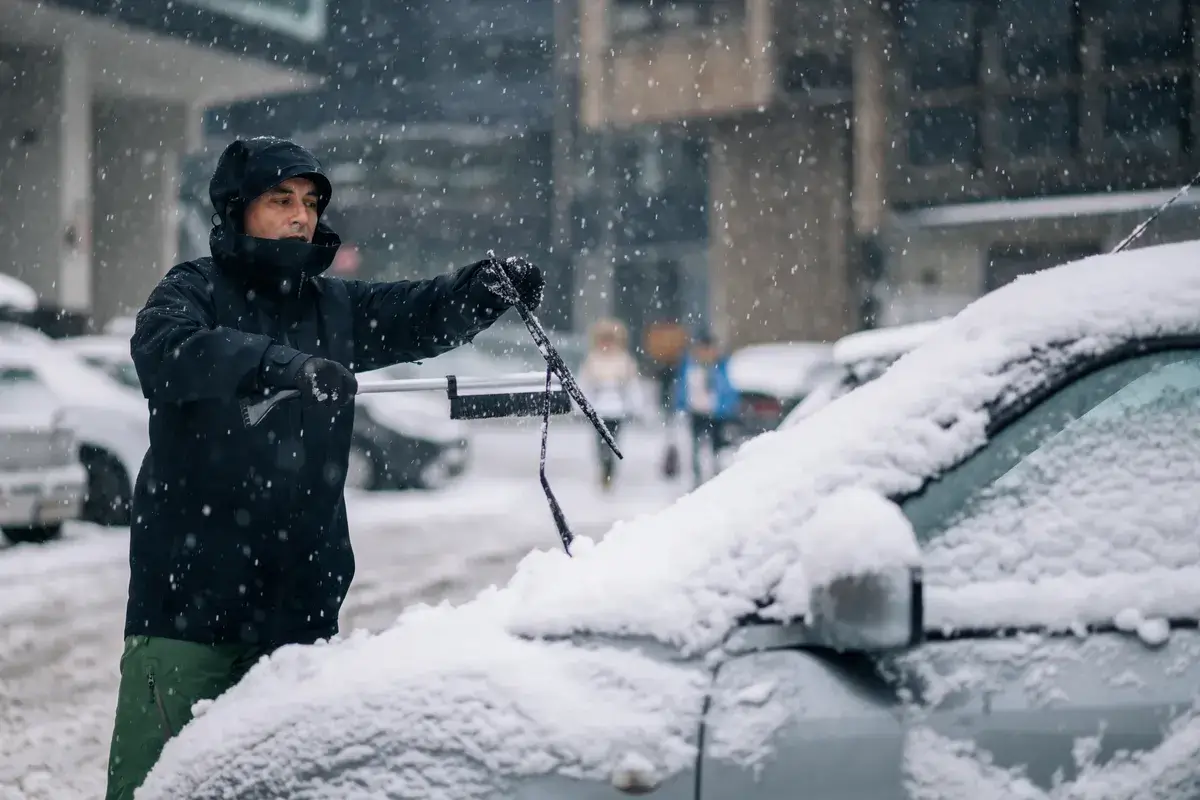 middle-aged-man-cleaning-car