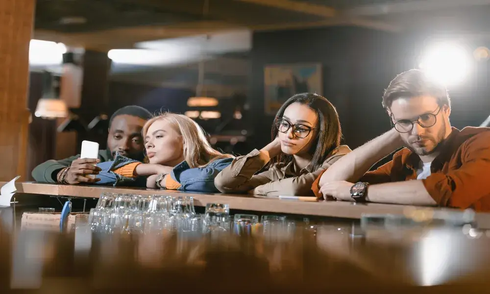 young-friends-at-bar-waiting