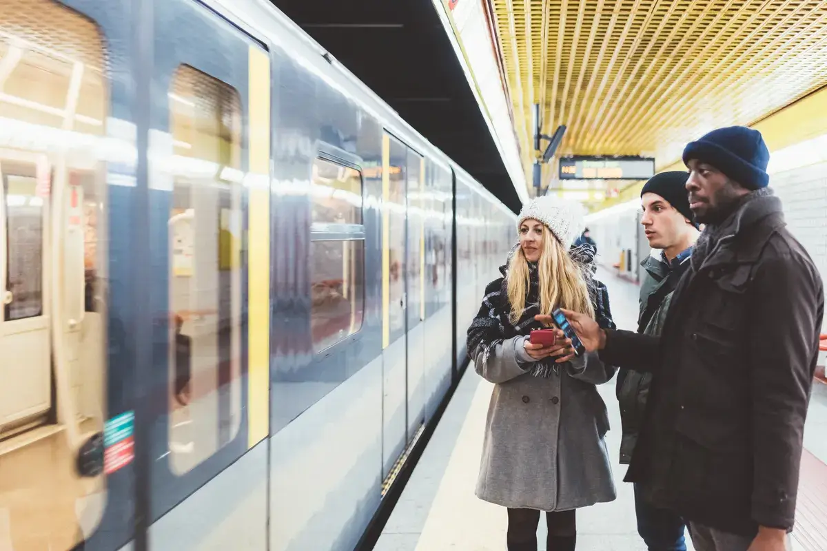 three-people-young-multiethnic-using