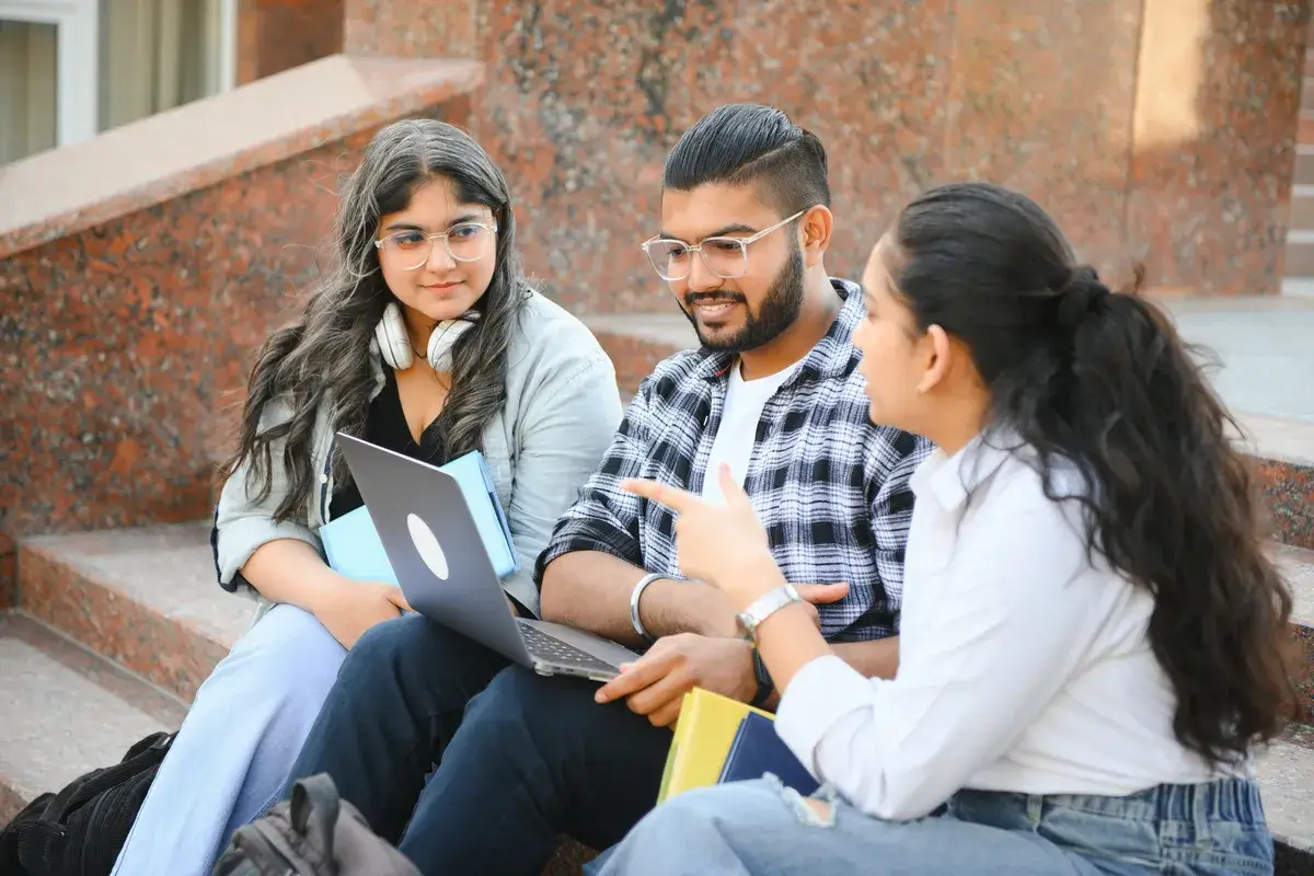 group-of-smiling-multiethnic-near-university