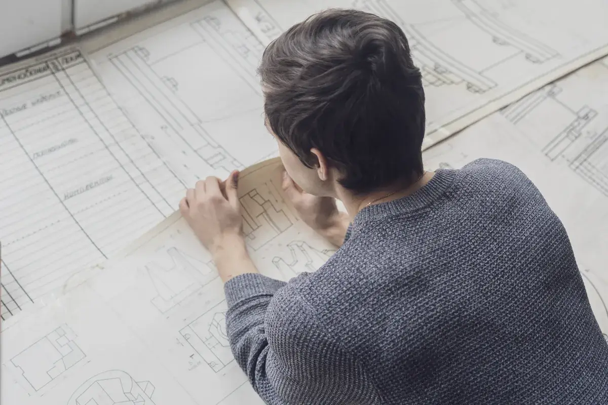 young-architector-working-on-his-house-