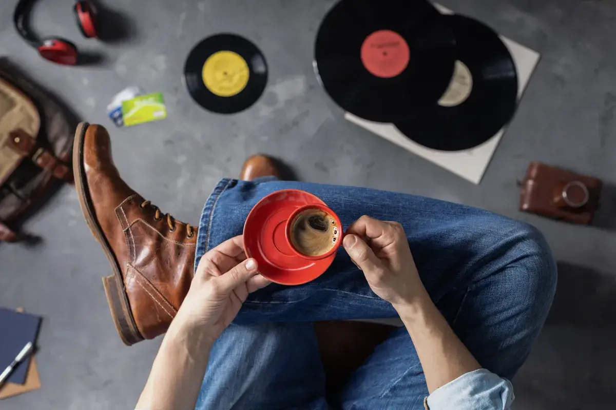 male-hand-holding-cup-of-coffee