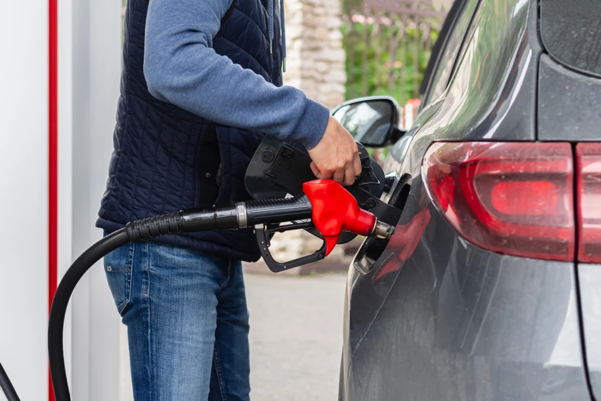 man-fills-his-black-car-with-fuel