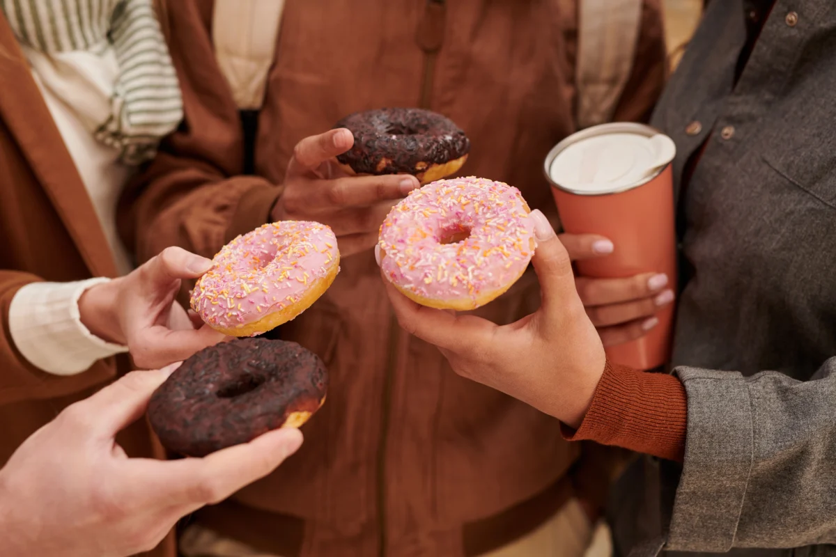 friends-holding-donuts-together