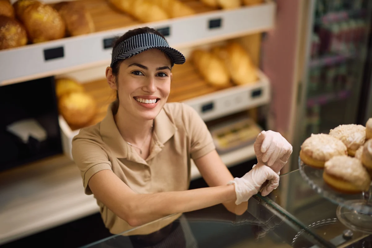 happy-woman-working-in-a-bakery