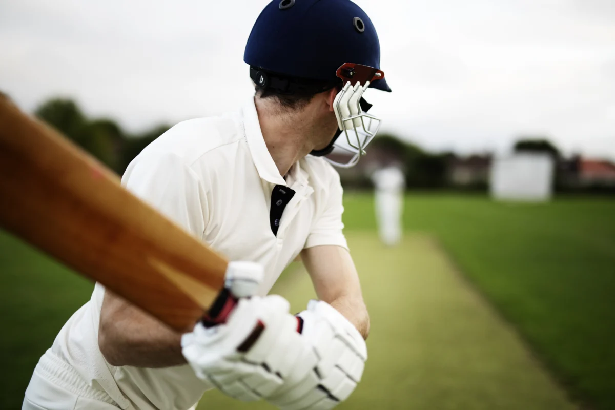 athlete-holding-cricket-bat-wearing